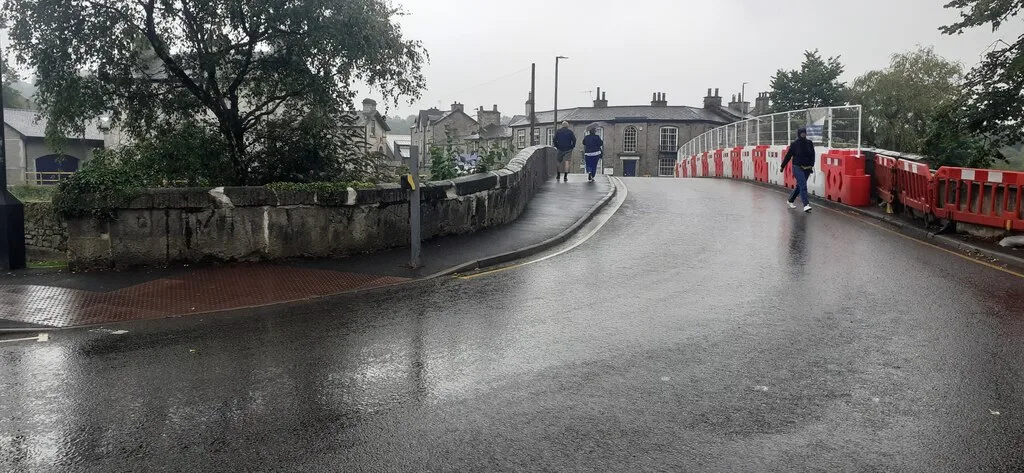 Miller's Bridge carrying Bridge Street over the River Kent. All road bridges over the Kent stay open through the flood defence works